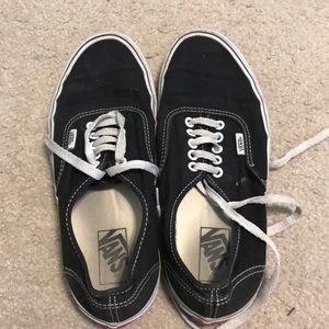 worn black vans